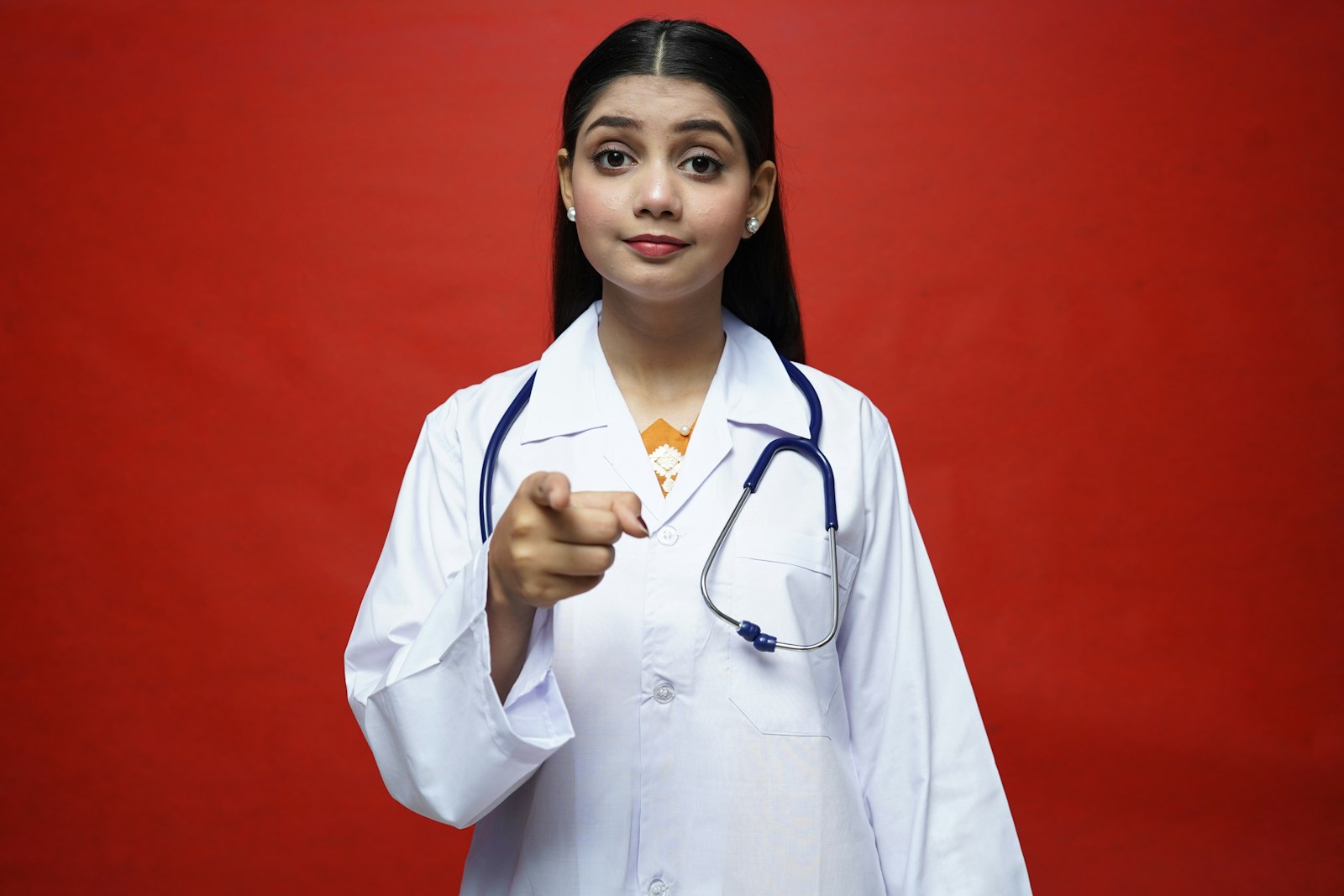 a person in a white coat